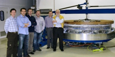 CEFCA team and AMOS staff next to the mirrors CEFCA team and AMOS staff next to the mirrors