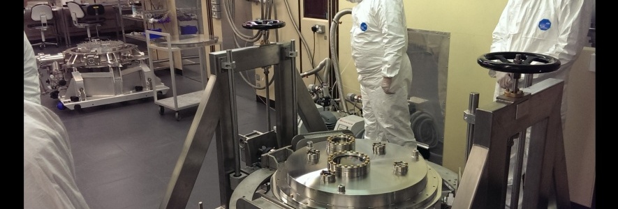 View of the cryostat on the trolley in the e2v clean room. View of the cryostat on the trolley in the e2v clean room.