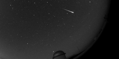 Bolide captured by the All-Sky camera at the OAJ (cropped image) on the night of the 27<sup>th</sup> of July been part of the Perseids. The dome of JST250 can be seen as well. Bolide captured by the All-Sky camera at the OAJ (cropped image) on the night of the 27<sup>th</sup> of July been part of the Perseids. The dome of JST250 can be seen as well.